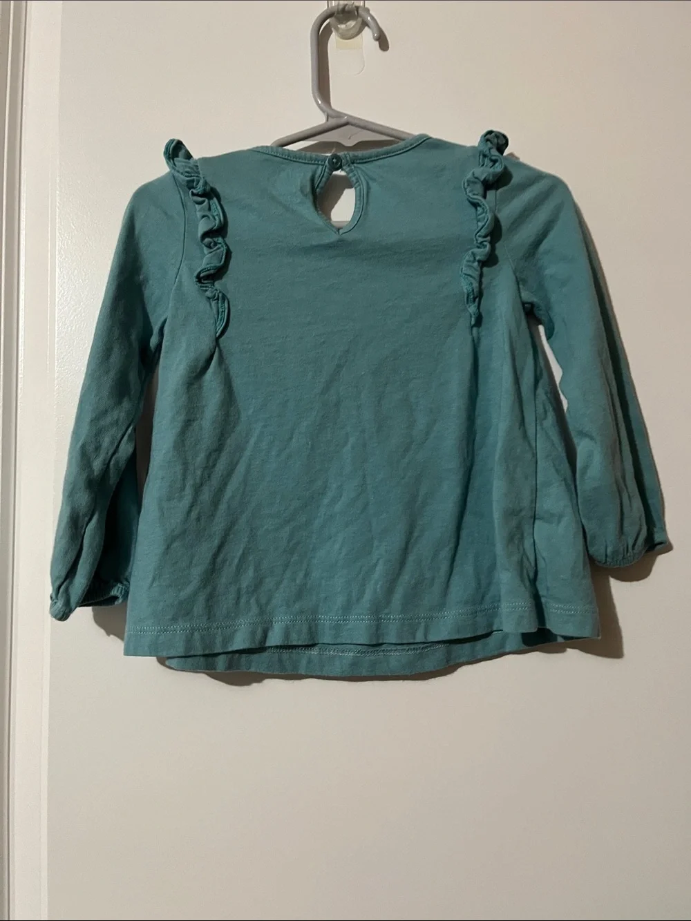 child of mine teal long-sleeve top with embroidered florals